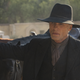 The elder William (Ed Harris) contemplates a hat change.